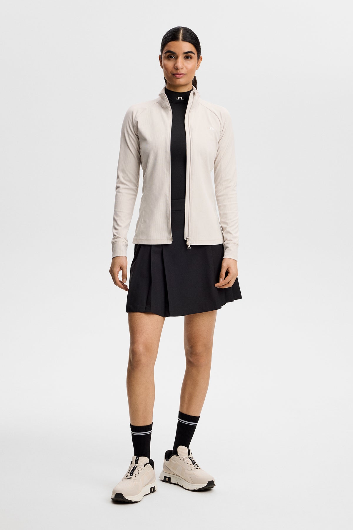 J.Lindeberg Mel Rib Mid Layer Moonbeam – dettaglio del tessuto sul campo