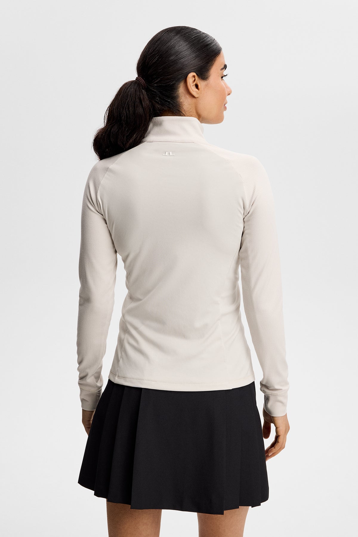 J.Lindeberg Mel Rib Mid Layer Moonbeam – dettaglio cerniera frontale e cuciture