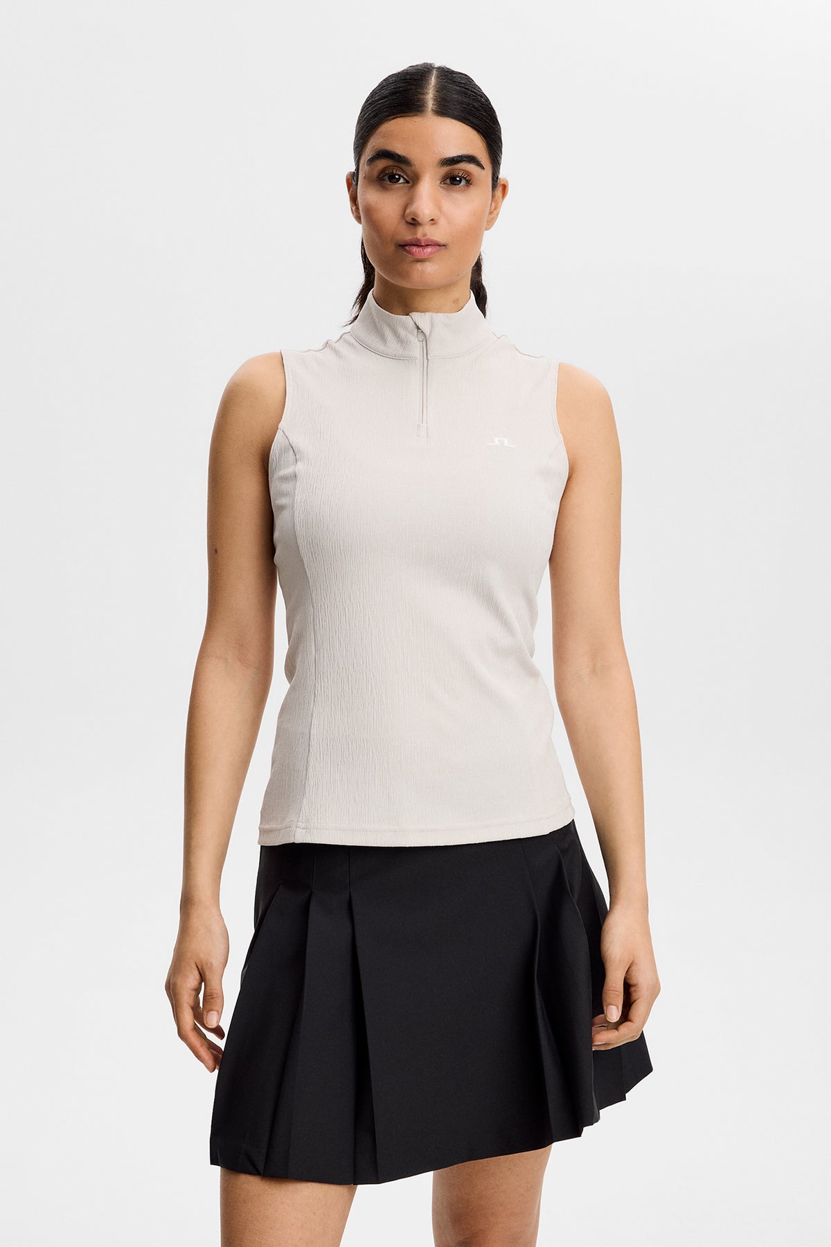 Top senza maniche J.Lindeberg Tia Moonbeam – vista frontale con colletto a lupetto e mezza zip