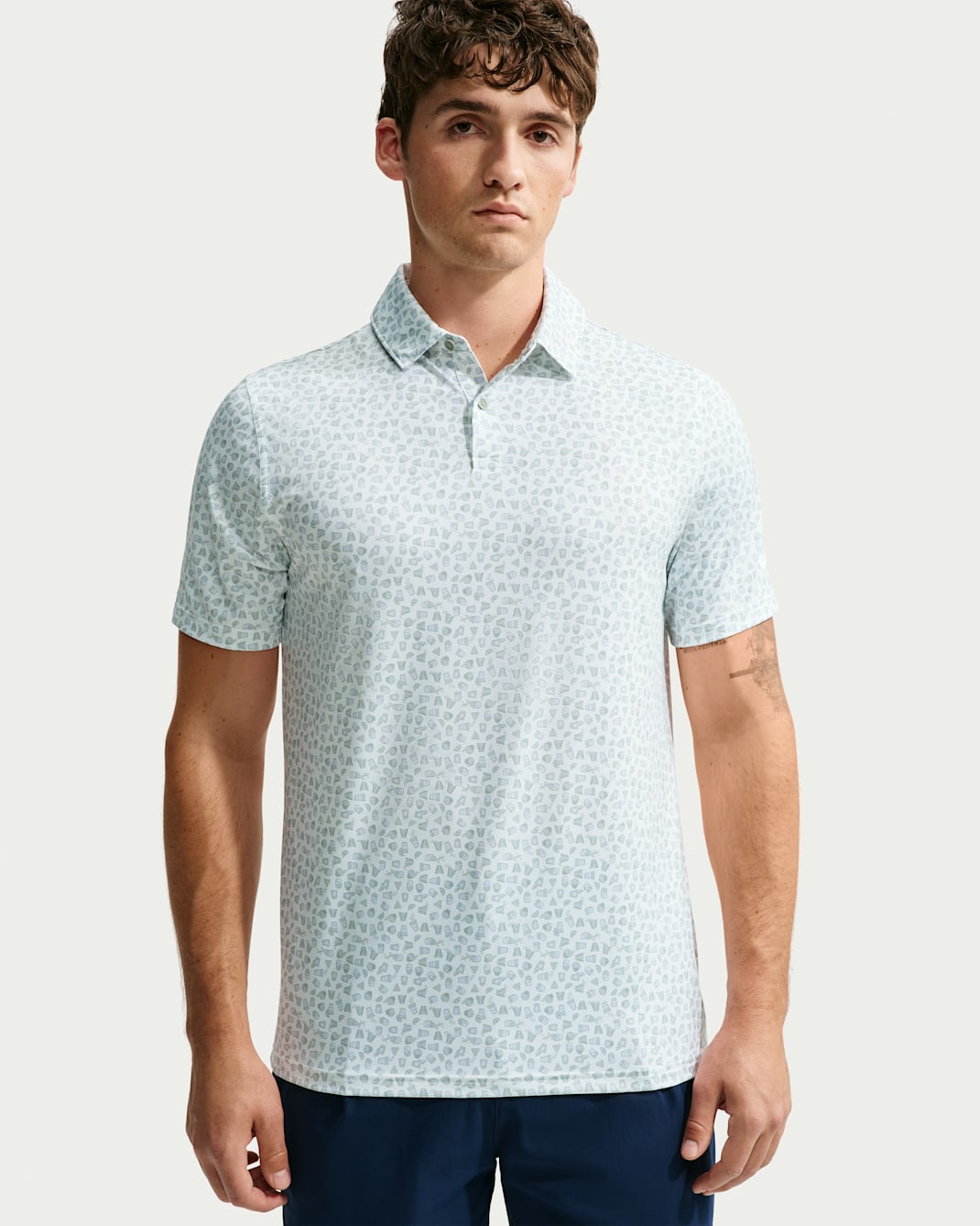 Polo da golf Nike Velocity Dri-FIT Micro-Print – Verde Giada/Bianco, badge Materiali Riciclati