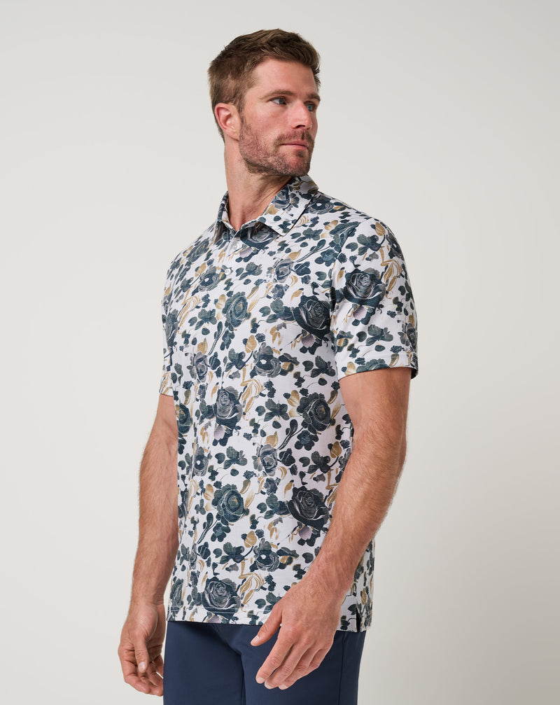 Travis Mathew Featherweight Villa Polo – dettaglio stampa floreale su bianco