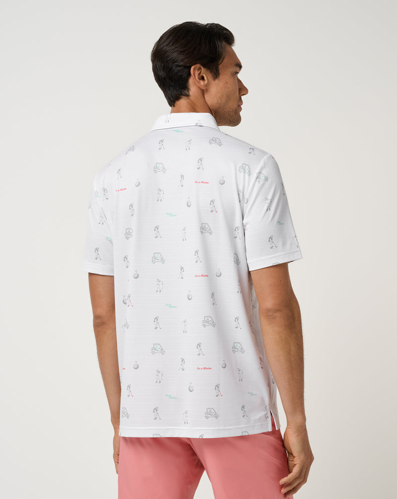 Travis Mathew On A Mission Polo – dettaglio della perforazione a strisce e della grafica dell'astronauta